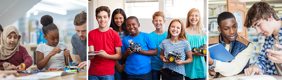 Elementary, middle, and high school students working at their group levels in a club Elementary, middle, and high school students working at their group levels in a club